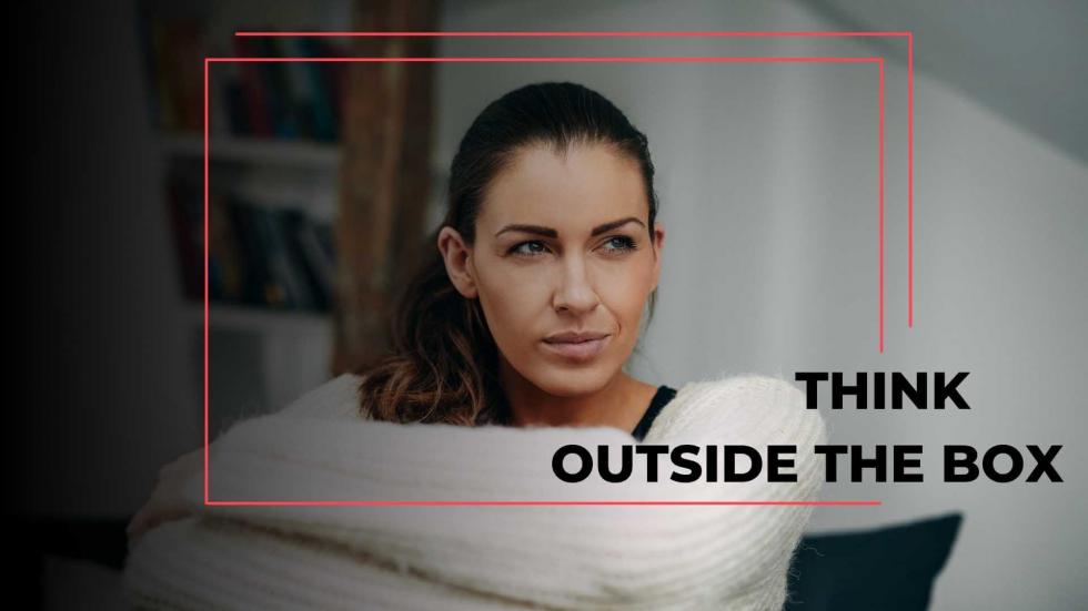 women with arms crossed thinking